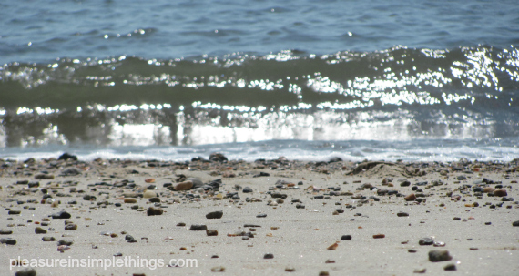 a photo of the water meeting the shore